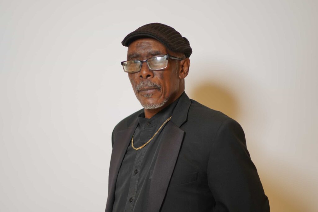 Older black man wearing a jaunty hat