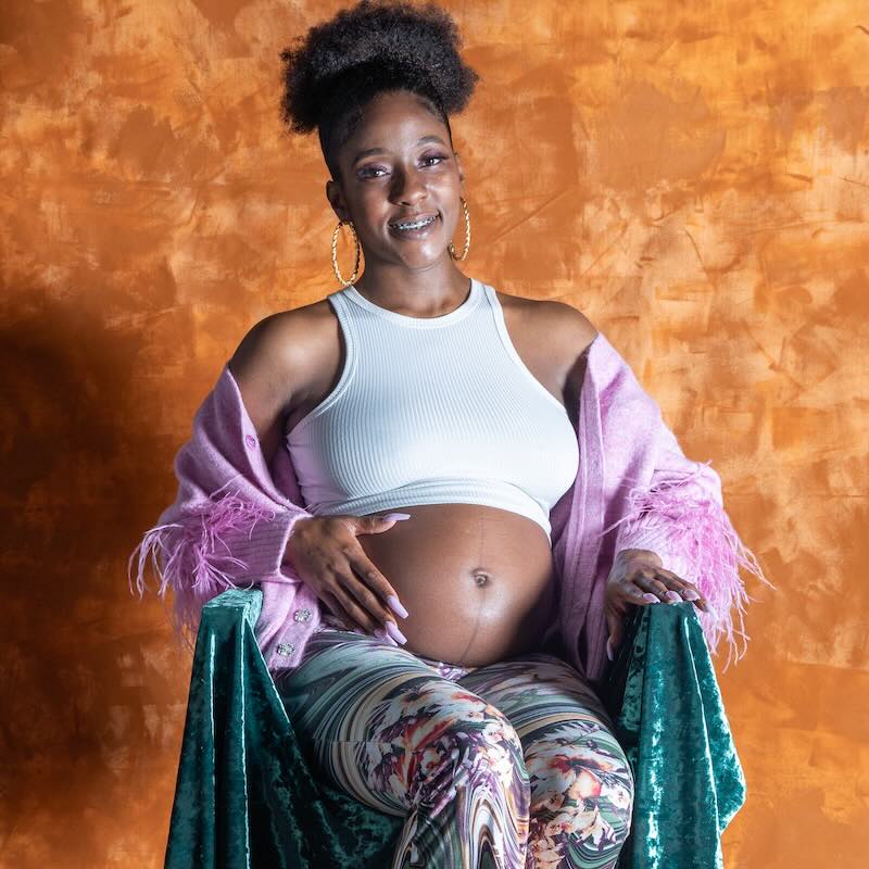 Young, black pregnant mother