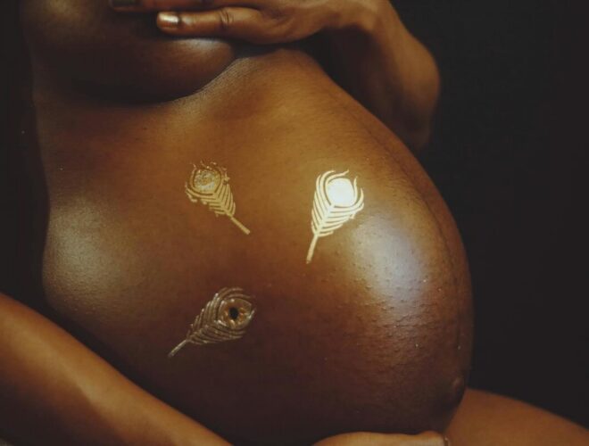 close up of pregnant woman's belly