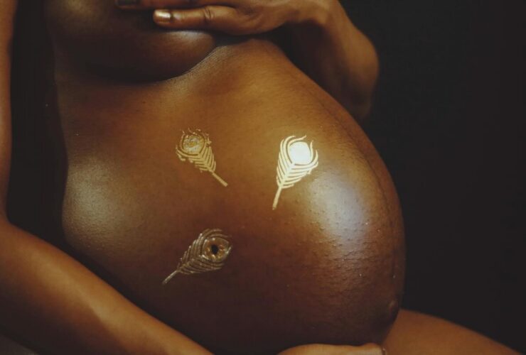 close up of pregnant woman's belly